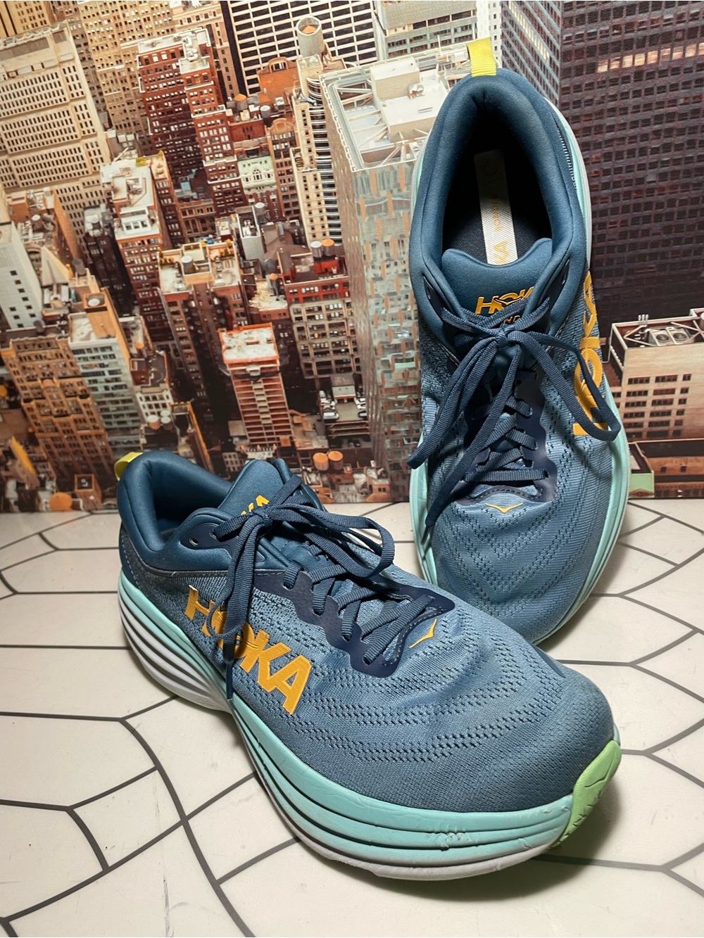 Hoka Men's Blue Running Shoes with Mint Soles & Yellow Logo